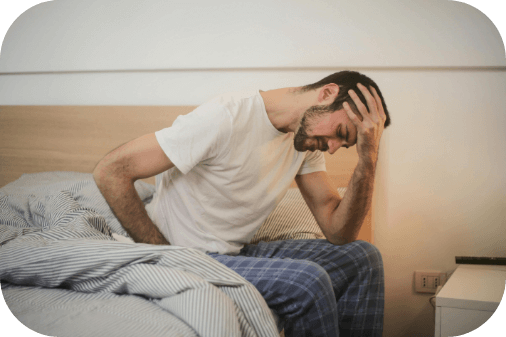 Un homme fatigué et malade à cause de ses TCA